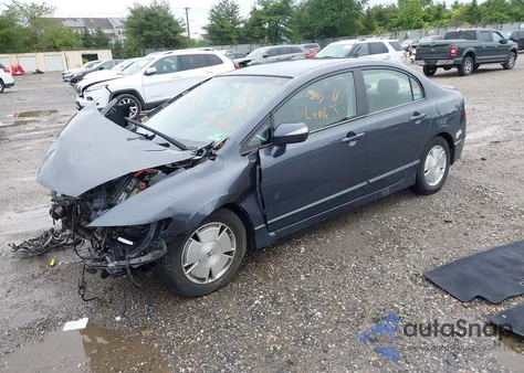 2006 Honda Civic Hybrid z USA, uszkodzony, nr VIN JHMFA36236S024533